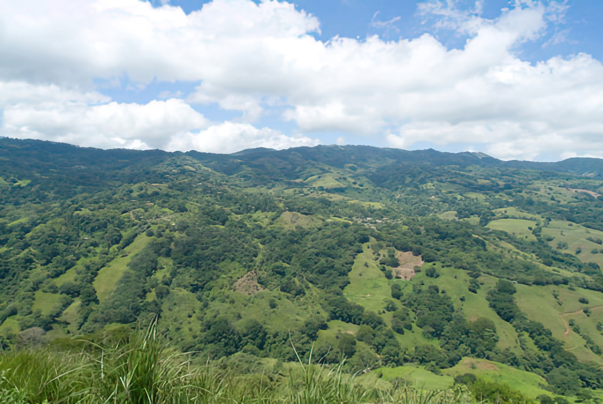 Open pasture sloping toward the Central Valley at Orchid Point Estates, Puriscal, Costa Rica